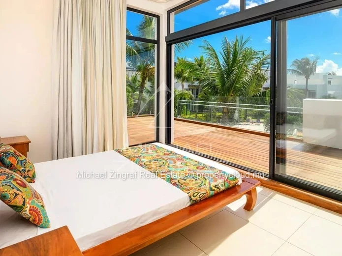 Exceptional 4-Bedroom Penthouse with Panoramic Lagoon Views at Azuri Golf & Beachfront Village