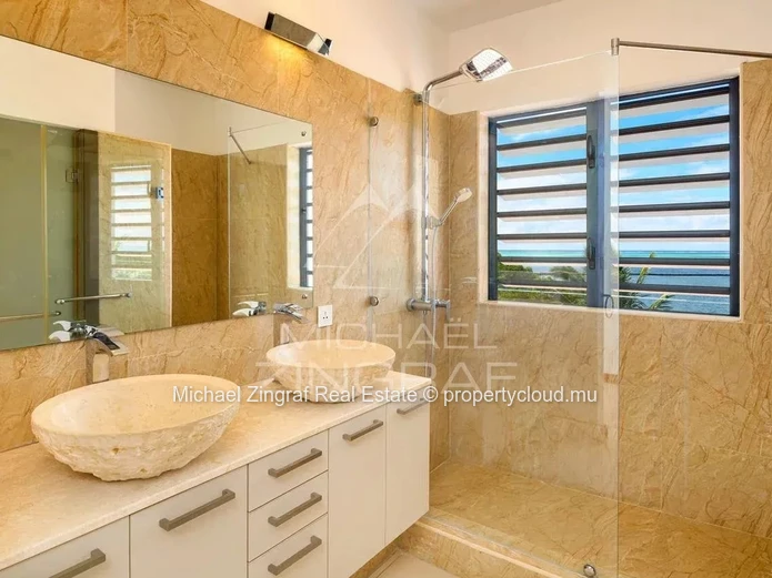 Exceptional 4-Bedroom Penthouse with Panoramic Lagoon Views at Azuri Golf & Beachfront Village